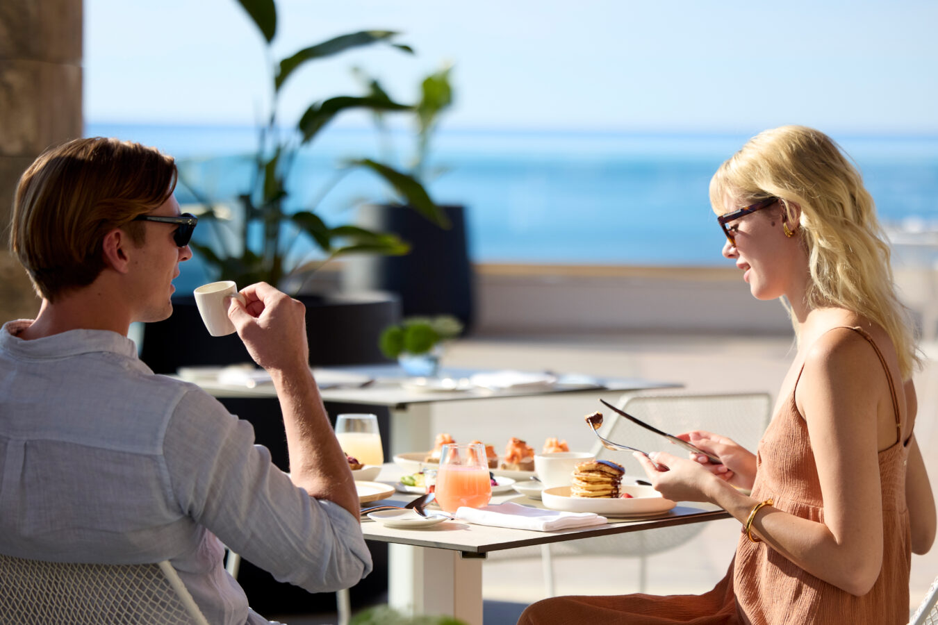 Couple enjoying breakfast at Boutique 5 Hotel & Spa, one of best luxury settings for adults-only in Rhodes, Greece.