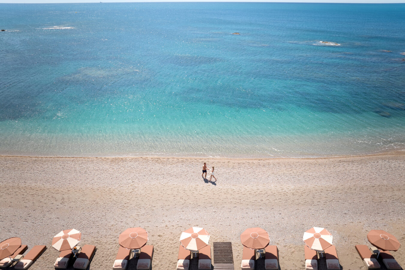 The serene shoreline of Boutique 5 Hotel & Spa, one of H Hotels Collection’s luxury hotels on the beach, Rhodes.