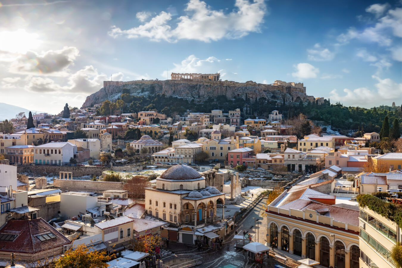 Aerial view of Monastiraki and the Acropolis on a crisp, sunny October day, offering the perfect backdrop for an unforgettable Autumn holiday in Athens.