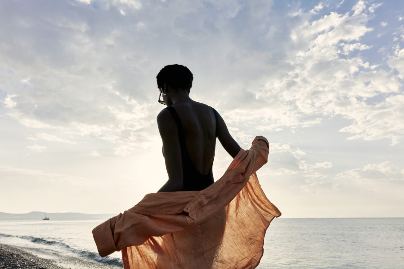 Guest on the beach in Rhodes, Greece, one of the best islands to visit in Autumn without crowds.